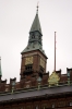 Шпиль здания Ратуши в Копенгагена. Наверх ведут 300 ступеней, туда можно подняться и полюбоваться видом Копенгагена. Высота здания - 106 метров.